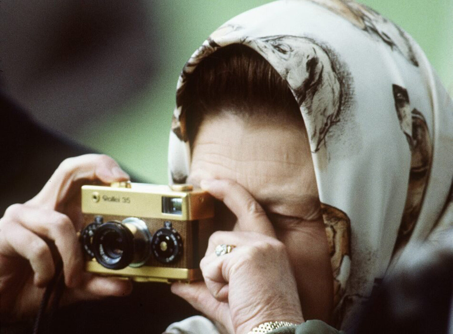 Queen Elizabeth II photographing with her Rollei 35
