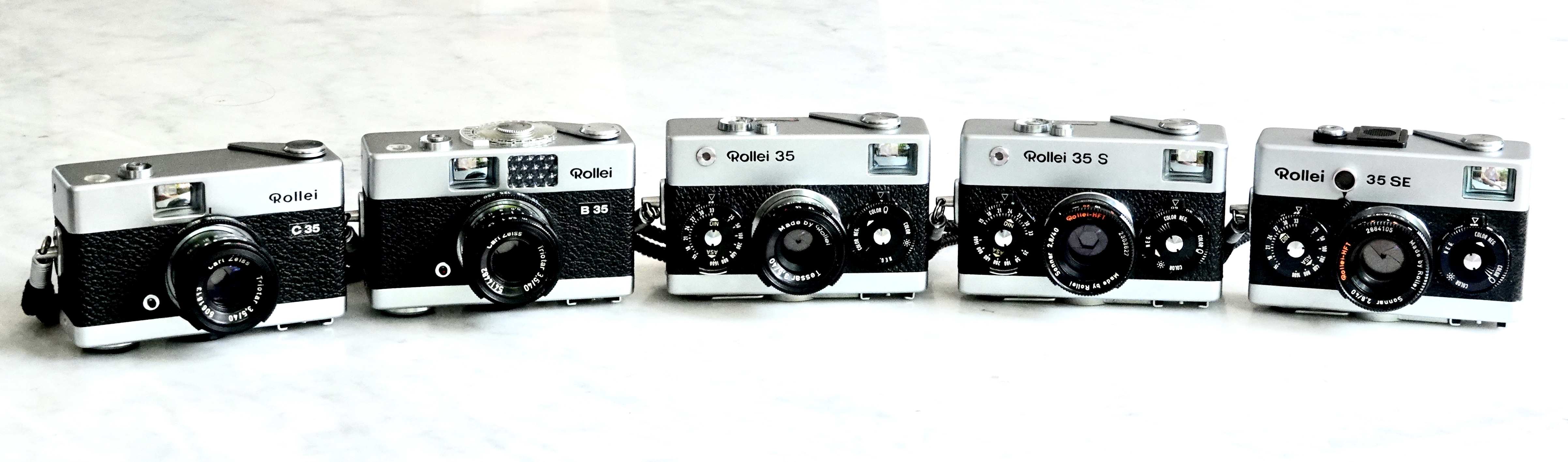 Collection of Rollei 35 cameras showing different models